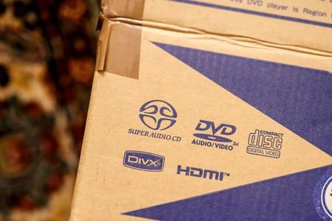 Multimedia Format Logos on Cardboard Packaging Stock Photos