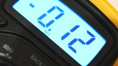 Multimeter digital screen close up changing electrical voltage Stock-Footage 158370390