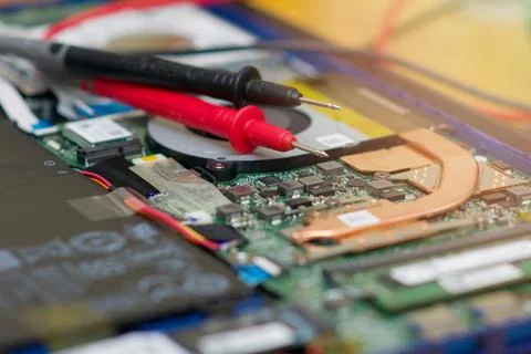A multimeter is an electronic measuring device that can measure voltage Stock Photos