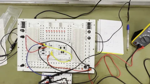 Multimeter Measuring Current Voltage On Electronic Breadboard Circuit Stock Footage 172240400
