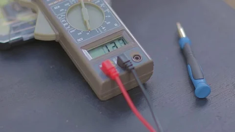 Multimeter showing different values on its screen. Video stock 76942193