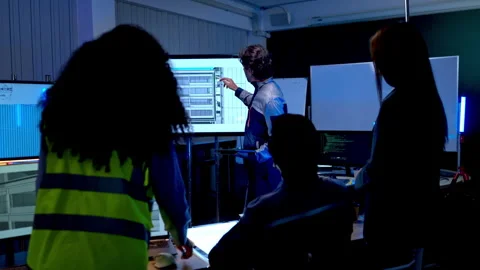 Multinational engineering and technology team collaborating Stock Footage 340455303