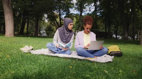 Multinational female students getting ready for tests together, doing math Stock Footage 219427688