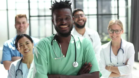 Multinational group of doctors and interns standing together. Stock Footage 223370893