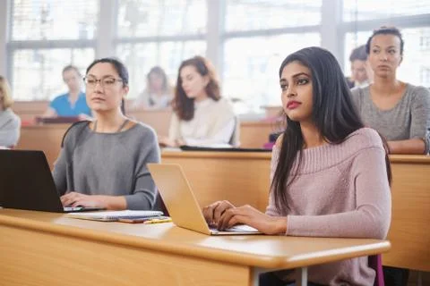 Multinational group of students in an auditorium Stock Photos