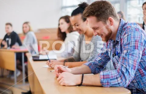 Multinational group of students in an auditorium Stock Photos