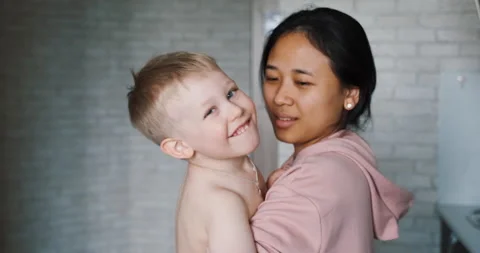Multinational mom and child, mixed-race family of parent and son happy together. Stock-Footage 132553222