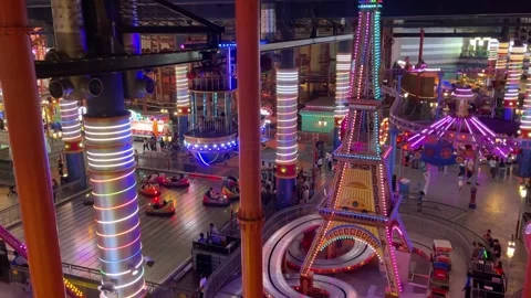 Multiple Amusement Rides Operating Simultaneously At Indoor Theme Park Stock Footage 310032302
