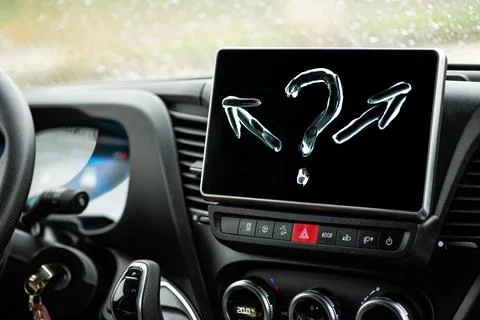 Multiple arrows and question marks on vehicle screen Stock Photos