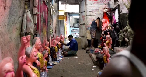 Multiple Artisans working round the clock on Vishwakarma Idols Stock Footage 143607282