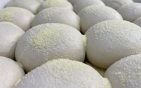 Multiple Ball of pizza dough on table . Stock-Fotos