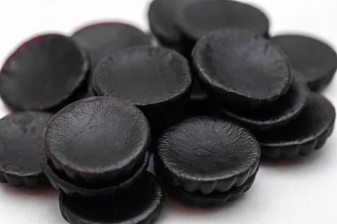 Multiple Black Licorice Drops Stock Photos