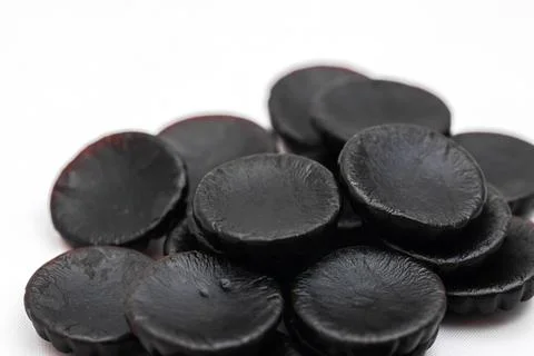 Multiple Black Licorice Drops Stock Photos