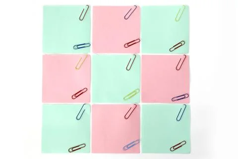 Multiple blank sheets for notes with paper clips isolated on white background Foto stock
