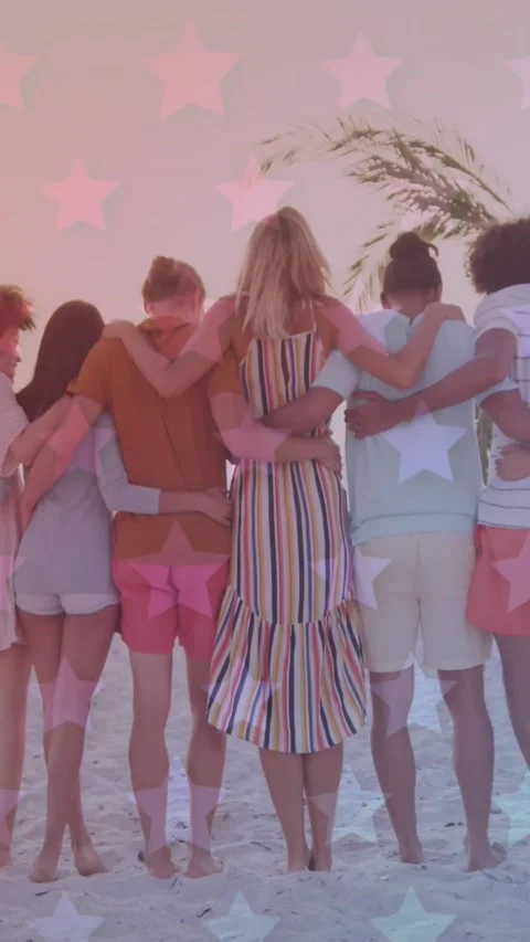 Multiple blinking stars against rear view of group of friends dancing on the Stock Footage 342004133