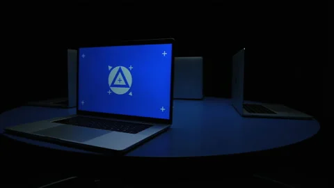 Multiple blue screen laptops circling 스톡 동영상 220533241