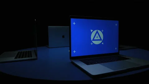 Multiple blue screen laptops with markers circling nonstop slow 스톡 동영상 220533542