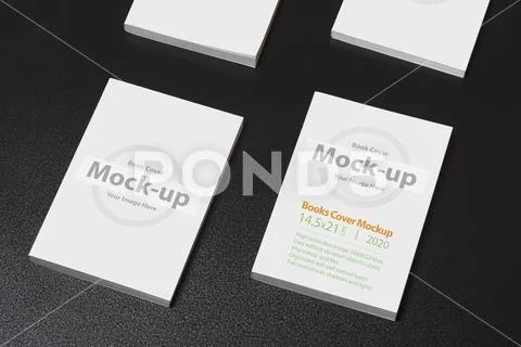 Multiple books with blank cover on dark glossy table mock-up series PSD Template