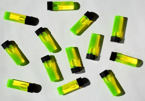 Multiple bottles, tubes with fluorescein under natural white light Stock Photos