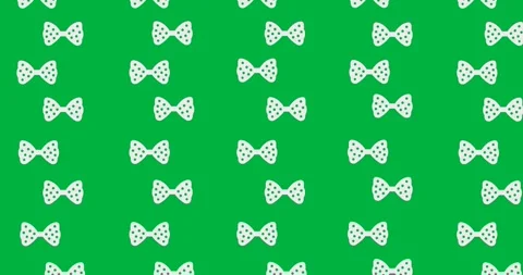 Multiple bow tie icons with polka dots pattern in seamless pattern against Stock Footage 318338352