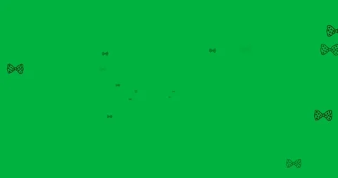 Multiple bow tie icons with polka dots pattern floating against copy space on 스톡 동영상 318338375