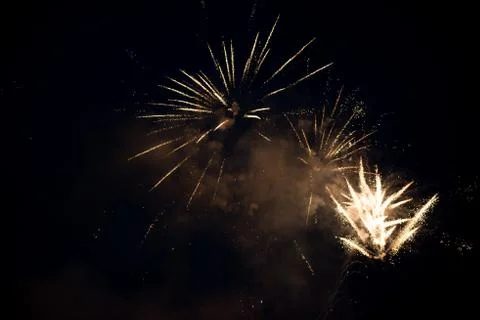 Multiple bright colorful fireworks explosion in the sky Stock Photos