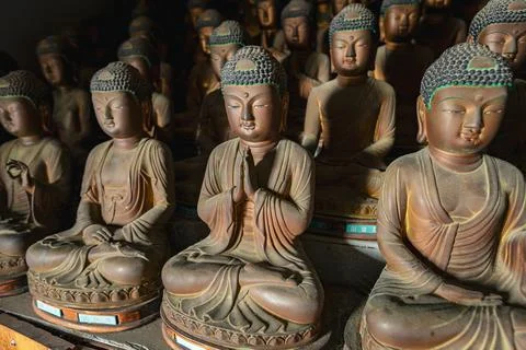 Multiple Buddha statues in Seokbulsa Mountain temple in Busan, South Korea Stock Photos