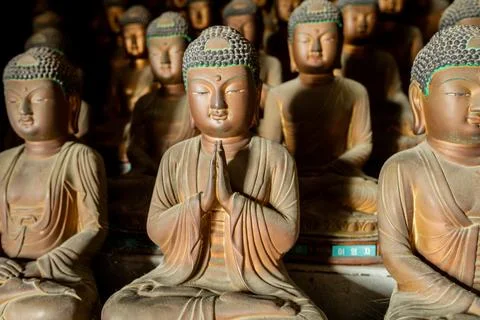 Multiple Buddha statues in Seokbulsa Mountain temple in Busan, South Korea Stock Photos