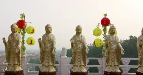 Multiple buddhist statues during the sunset at Fo Guang Shan Memorial in Taiwan. Stock Footage 140253565