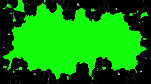 Multiple camera operators, photographers, reporters covering event, green screen Stock Footage