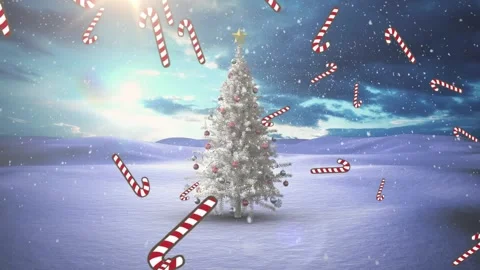Multiple candy cane icons and snow falling over christmas tree on winter Stock Footage 330343563
