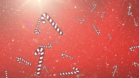 Multiple candy canes icons and snow falling over spot of light on red background Stock Footage 162078652