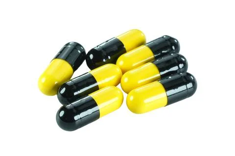 Multiple capsules isolated on white background with clipping path. Stock Photos