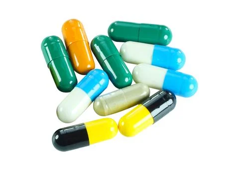 Multiple capsules isolated on white background with clipping path. Stock Photos