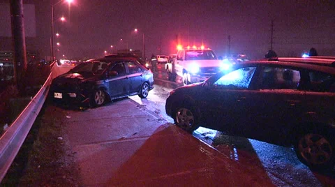 Multiple car crash on icy road in freezing rain v7 Stock Footage 36641962