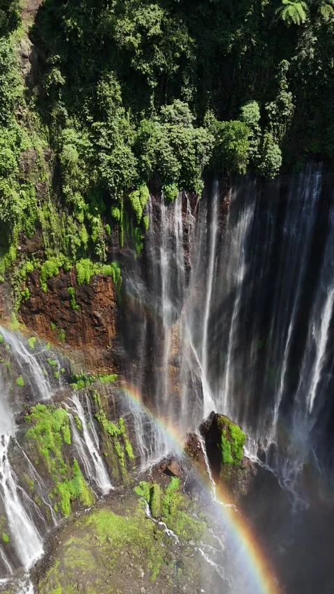 Multiple Cascading Water Streams at Tumpak Sewu Forming Natural Pattern Stock Footage 329629185