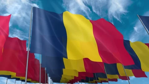 Multiple Chad flags seamless looping waving on blue sky Stock Footage 343677877