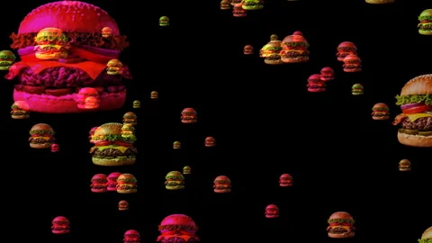 Multiple cheeseburgers float against a deep black background creating a sur.. Stock Footage 330265614