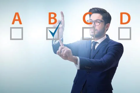 Multiple choice test question concept with business people Stockfoto's