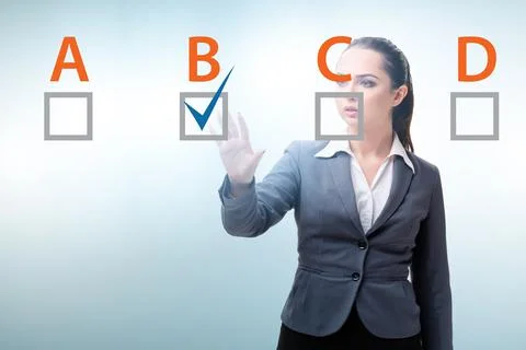 Multiple choice test question concept with business people Stockfoto's