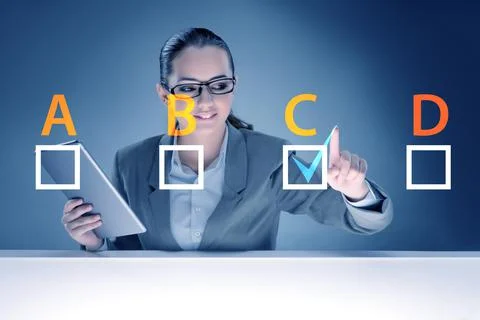 Multiple choice test question concept with business people Stockfoto's