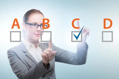 Multiple choice test question concept with business people Stockfoto's