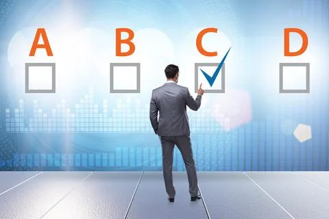 Multiple choice test question concept with business people Stockfoto's