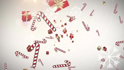 Multiple christmas gifts and candy cane icons falling against snowflakes Stock Footage 162932807