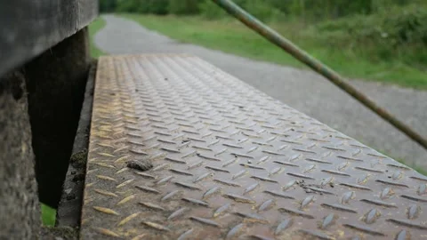 Multiple chrome nitrous oxide laughing gas drug cylinders Stock Footage 133364003