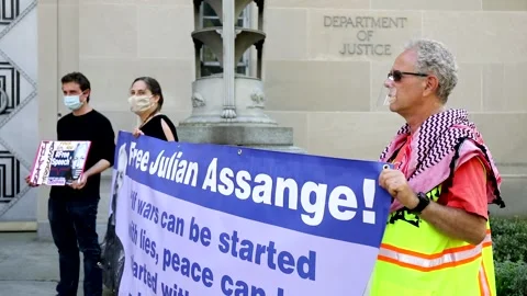 Multiple Clips of Julian Assange Protest at the DOJ Stock Footage 152172522