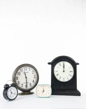 Multiple clocks isolated on a white background Stock-Fotos