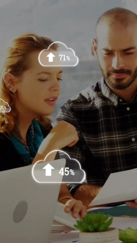 Multiple cloud icon with increasing percentage against group of people working Stock Footage 343498603