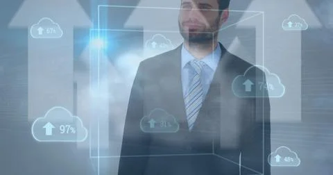 Multiple cloud icons with increasing percentage against caucasian businessman Stockfoto's