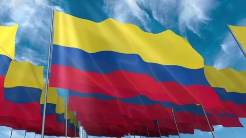 Multiple Colombia flags seamless looping waving on blue sky Stock Footage 343678092